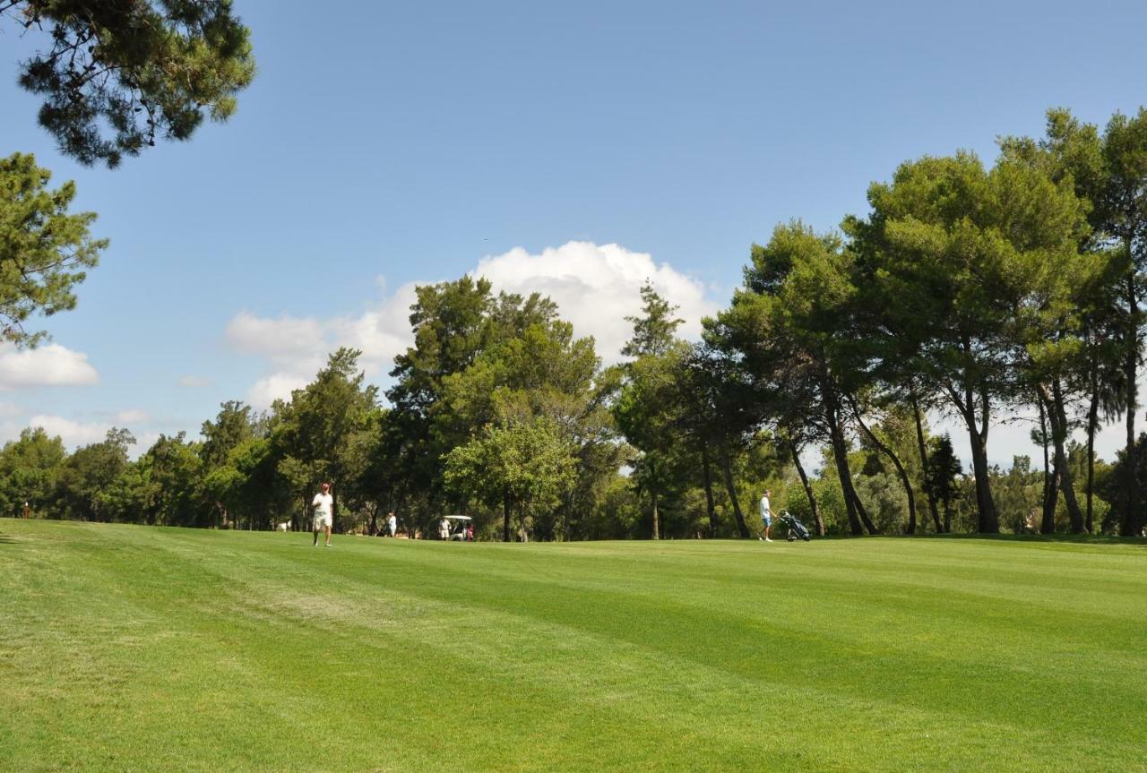 Between Golf And Beach Портиман Екстериор снимка