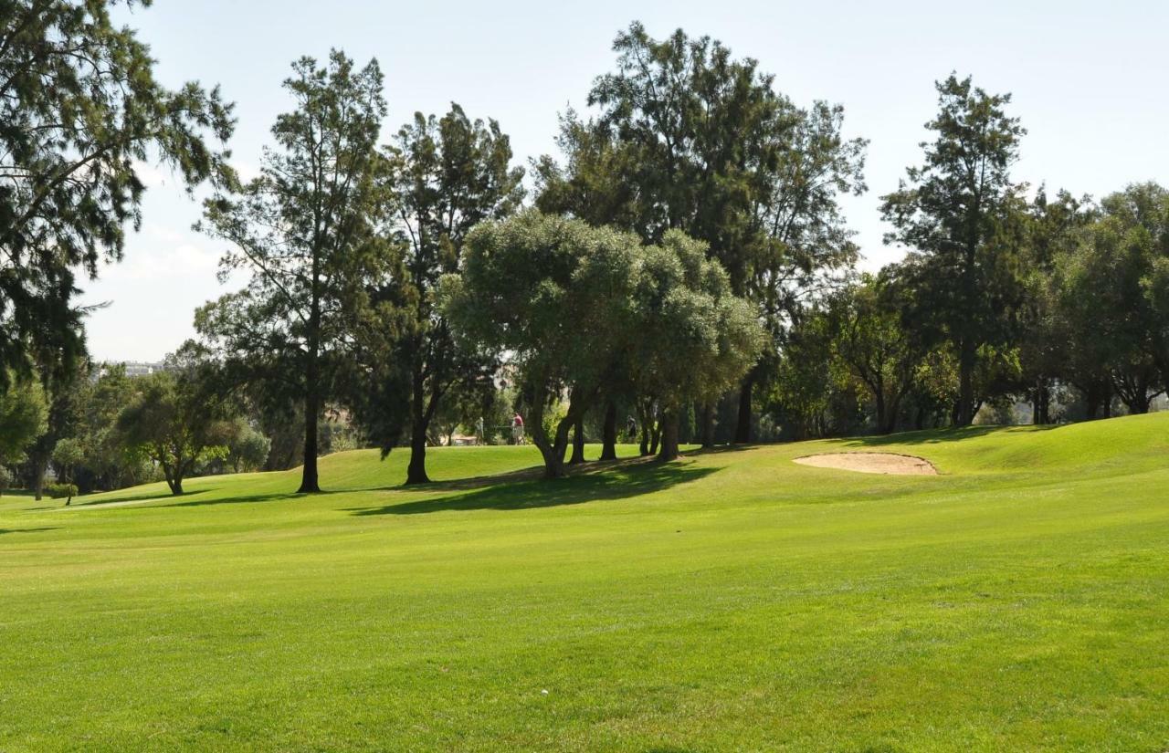 Between Golf And Beach Портиман Екстериор снимка